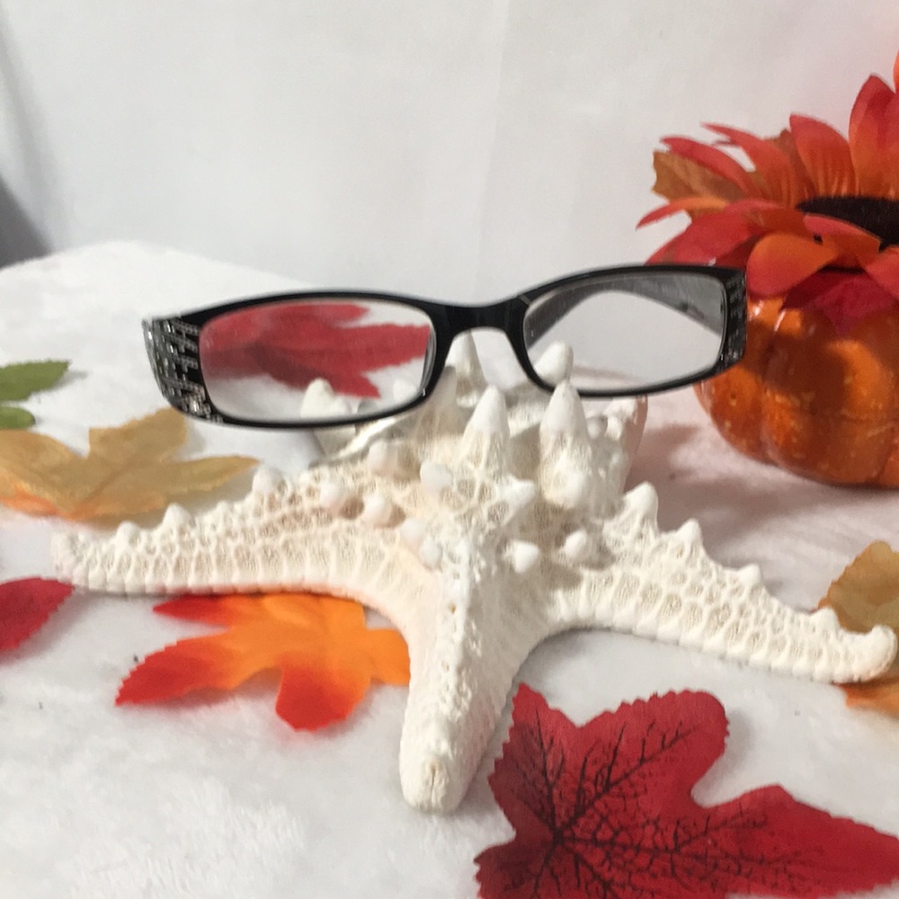 Foster Grant woman’s black reading glasses with faux rhinestones and tan swirls